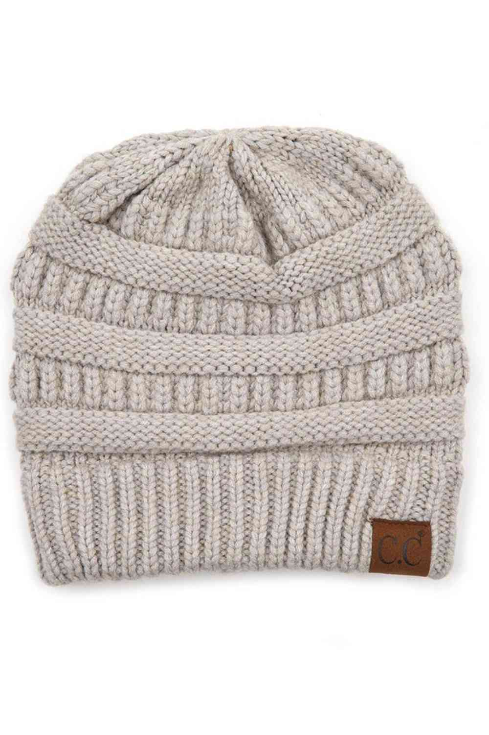 Warm Grey Wrap yourself in softness with this C.C Soft Yarn Knit Beanie, crafted from a premium blend of 47% rayon, 31% PBT, and 22% nylon. The luxurious rayon provides a silky feel against your skin, while the durable synthetic fibers ensure lasting wear through winter season.