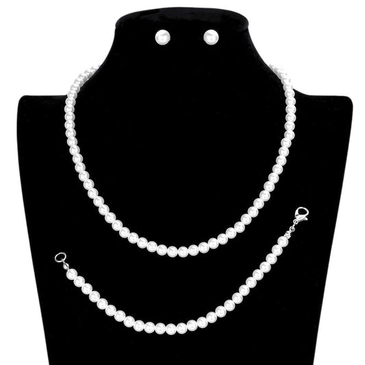 White 3-piece Pearl Necklace Set exudes elegance and sophistication. Made with high-quality pearls and delicate detailing, this set is perfect for adding a touch of glamour to any outfit. Each necklace can be worn separately or together for a versatile and timeless look.