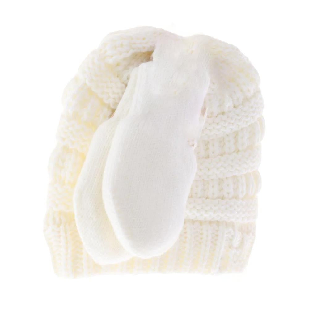 White BABY Solid C.C Beanie with Mitten Set provides essential warmth and comfort for your little one. Made from soft, high-quality materials, the beanie gently fits your baby's head to retain heat, while the matching mittens protect delicate skin from scratches and cold. This coordinated set balances functionality with a clean, solid design, making it an expert choice for everyday wear during cooler weather.