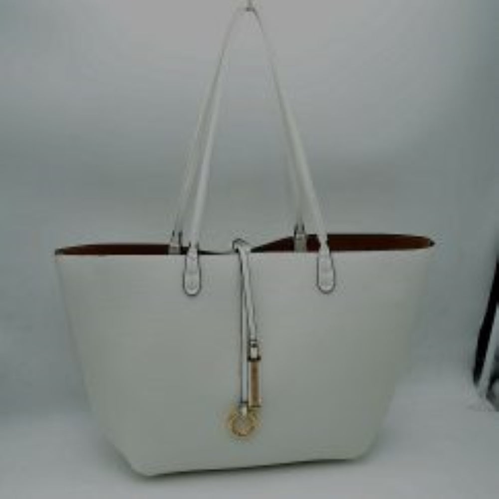 White-Beige This classic tote bag features a smooth exterior finish with a timeless trapeze silhouette, offering an elegant look for everyday use. Designed with an open top for quick access, the spacious main compartment provides ample storage space for daily essentials. Dual slim shoulder handles are securely stitched to the upper panels, while a decorative central drawstring tie accents the front, complete with a metallic ring and matching tab accent for a polished touch.