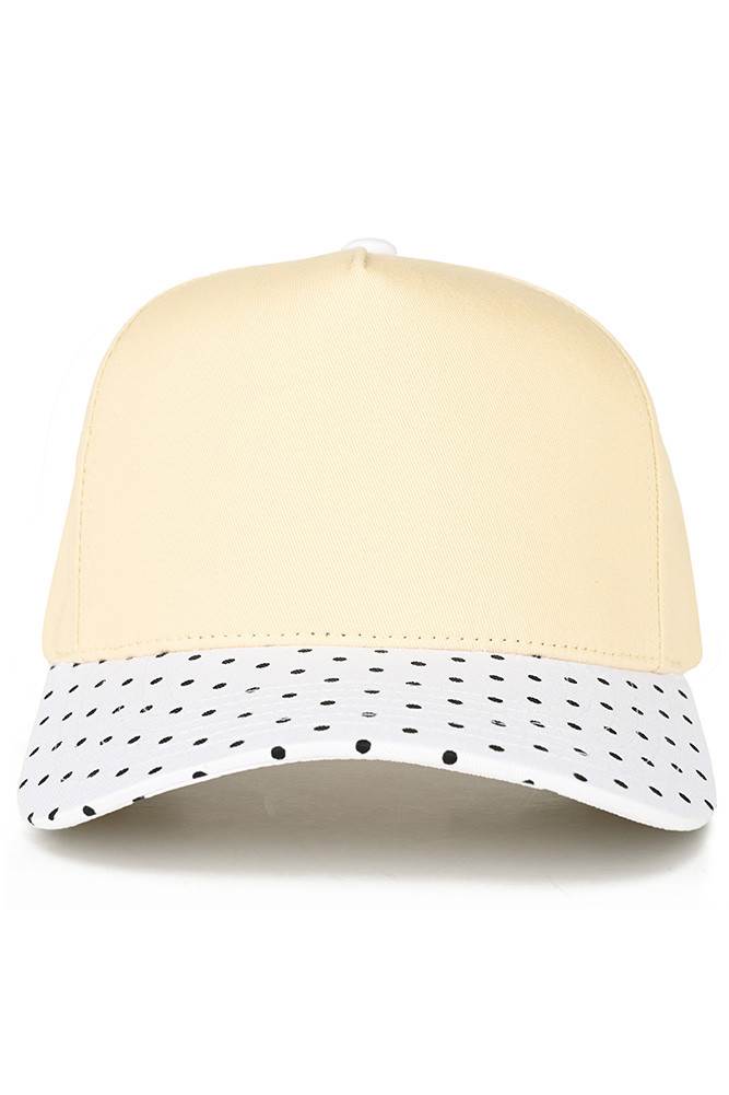 Classic style meets playful design with this C.C trucker hat. The small polka dot pattern adorns the brim, while the two-tone construction adds visual interest and versatility. Structured mesh panels provide breathability for all-day wear, making it perfect for casual outings, outdoor activities, or everyday comfort. The adjustable back ensures a secure fit for most head sizes. Whether you're heading to the beach, running errands, or just want a fun accessory, this hat delivers both style and function.