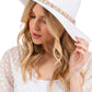 White Confetti Braided Chain Band hat combines sophisticated design with summer functionality. The distinctive braided chain band adds an elegant accent while providing superior sun protection. The lightweight construction ensures all-day comfort, making it an essential accessory for beach outings, garden parties, or casual summer strolls.