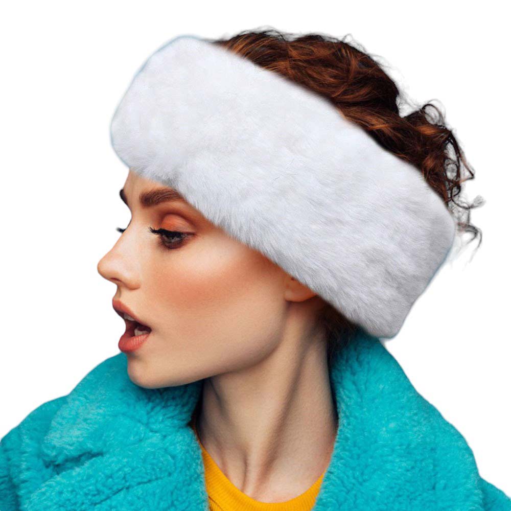 White Faux Fur Earmuff Headband, keeps your ears comfortably warm. The solid construction features luxurious faux fur for an elegant, yet practical look. Stay cozy and stylish during the coldest days of the year. Perfect winter gift for people you care about. 