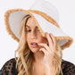 White Frayed Band and Trip Straw Sun Hat combines style and practicality. The frayed band adds a touch of texture, while the trip straw material provides superior sun protection. Perfect for a day at the beach or a stroll in the park, this hat will keep you both fashionable and protected.