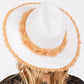 White Frayed Band and Trip Straw Sun Hat combines style and practicality. The frayed band adds a touch of texture, while the trip straw material provides superior sun protection. Perfect for a day at the beach or a stroll in the park, this hat will keep you both fashionable and protected.