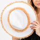 White Frayed Band and Trip Straw Sun Hat combines style and practicality. The frayed band adds a touch of texture, while the trip straw material provides superior sun protection. Perfect for a day at the beach or a stroll in the park, this hat will keep you both fashionable and protected.