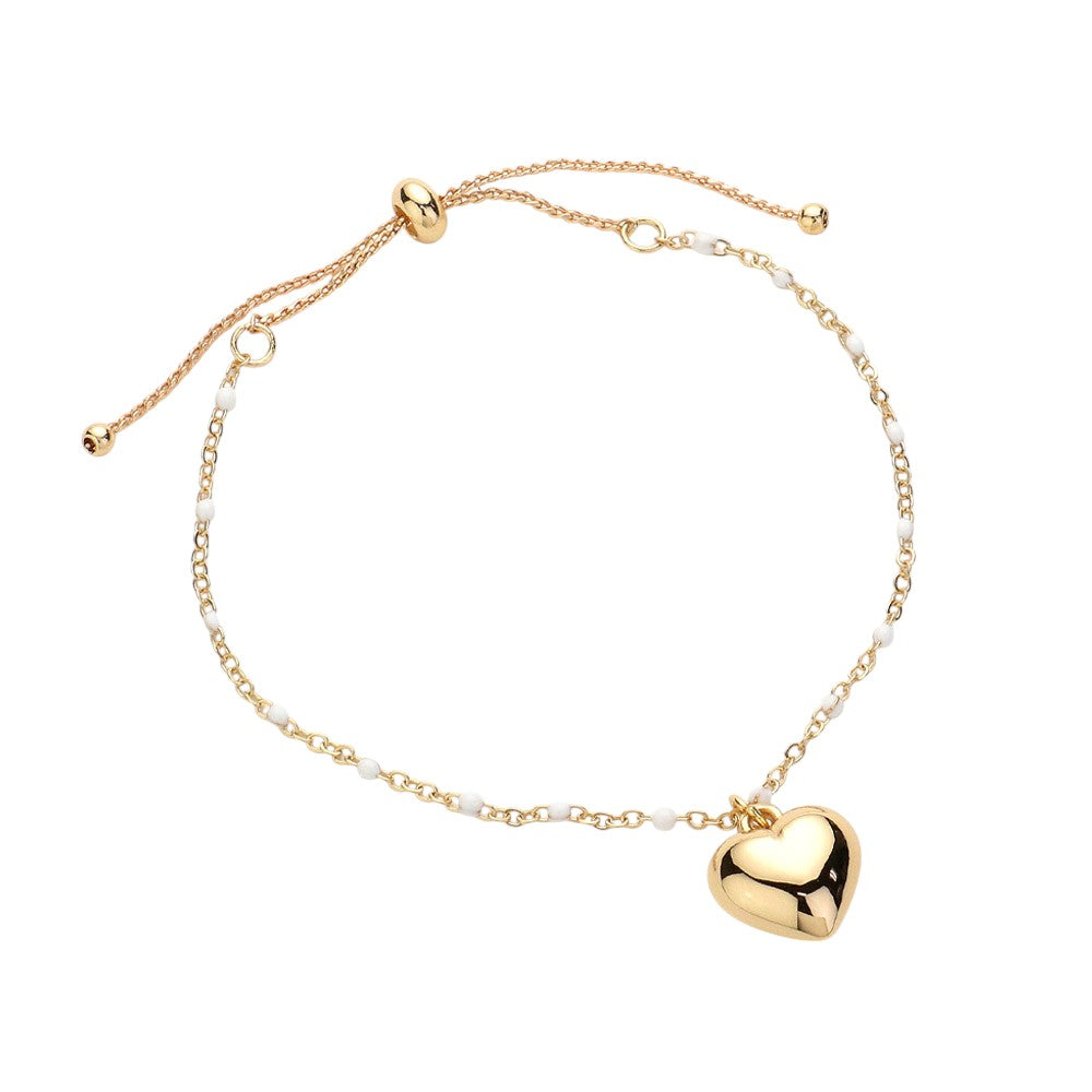 White Metal Heart Charm Beads Station Pull Tie Cinch Bracelet is a stylish and versatile accessory to add to your jewelry collection. The metal heart charm beads add a touch of elegance, while the pull tie cinch design allows for an adjustable and comfortable fit. Perfect for any occasion, this bracelet is a must-have for any fashion-forward individual