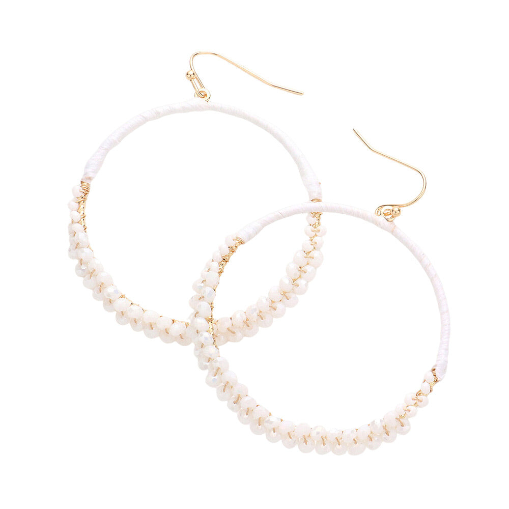 White Raffia Faceted Bead Wrapped Open Metal Circle Earrings, turn your ears into a chic fashion statement with these raffia faceted bead earrings! These open metal circle earrings are very lightweight and comfortable, you can wear these for a long time on occasion. The beautifully crafted design adds a gorgeous glow to any outfit.