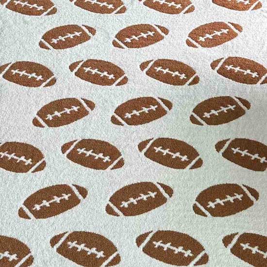 White Reversible Football Patterned Throw Blanket, is the perfect addition to your home décor and it's great for football fans! It offers two different football-inspired patterns. Enjoy cozy nights in with this reversible blanket and you won't have to miss any of the action on the field. Ideal gift for football lovers.