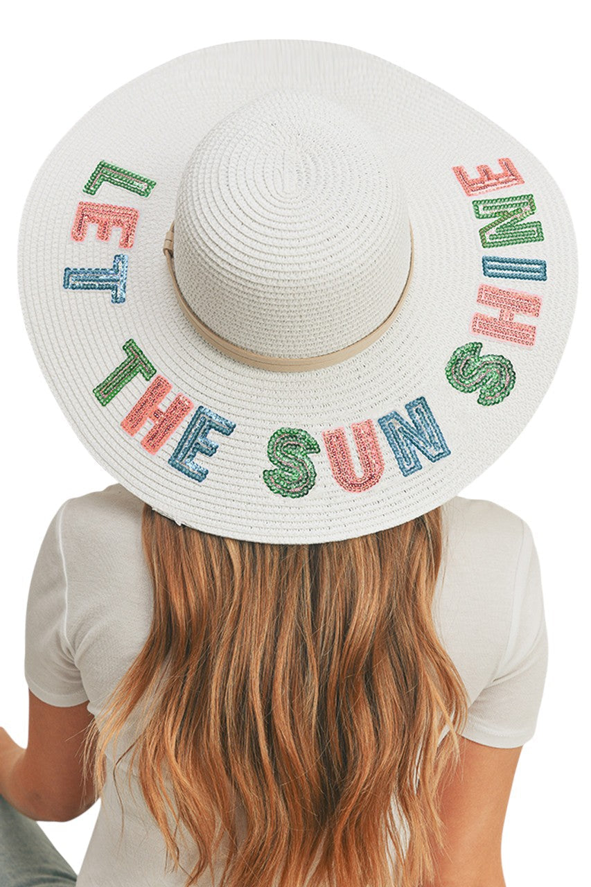 White THE SUNS SHINE Sequin Letter Floppy Hat combines superior sun protection with elegant design. The wide-brimmed silhouette features precision-applied sequin lettering that catches light beautifully while maintaining structural integrity throughout wear. Constructed with advanced materials that offer UPF protection without compromising on breathability or comfort. An essential accessory for discerning customers seeking both functionality and refined aesthetics.