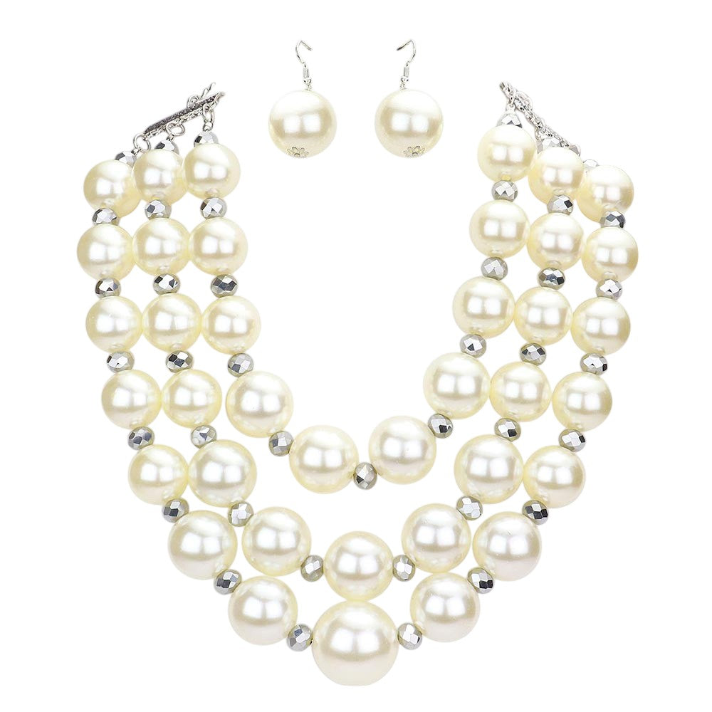 Triple Layered Chunky Pearl Necklace is a gorgeous addition to any outfit. Made with high-quality pearls in a unique triple layer design, this necklace adds a touch of elegance and sophistication to your look. Its chunky style makes a statement while still remaining versatile for any occasion. Upgrade your jewelry collection with this must-have piece. 