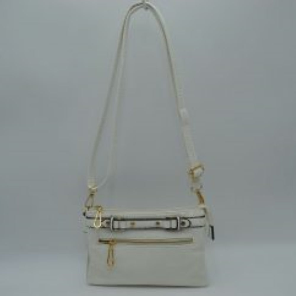 White This functional crossbody bag is designed for organized everyday use, featuring a textured exterior equipped with multiple secure storage compartments. The front panel includes a convenient horizontal zippered pocket accented with an oversized metallic zipper pull, situated beneath a decorative horizontal band detailed with metallic studs and loops.