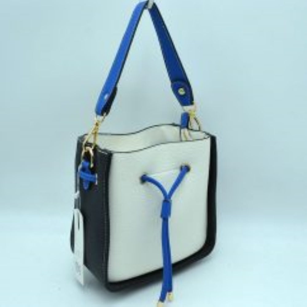 White This stylish bucket bag features a distinctive color-blocked design crafted with a pebbled exterior texture, making it a versatile accessory for everyday use. The front panel includes a classic cinch drawstring closure detailed with contrasting trim and polished metallic aglets that open to a secure main storage compartment. Built for flexibility, it is equipped with a structured shoulder handle, an adjustable long shoulder strap