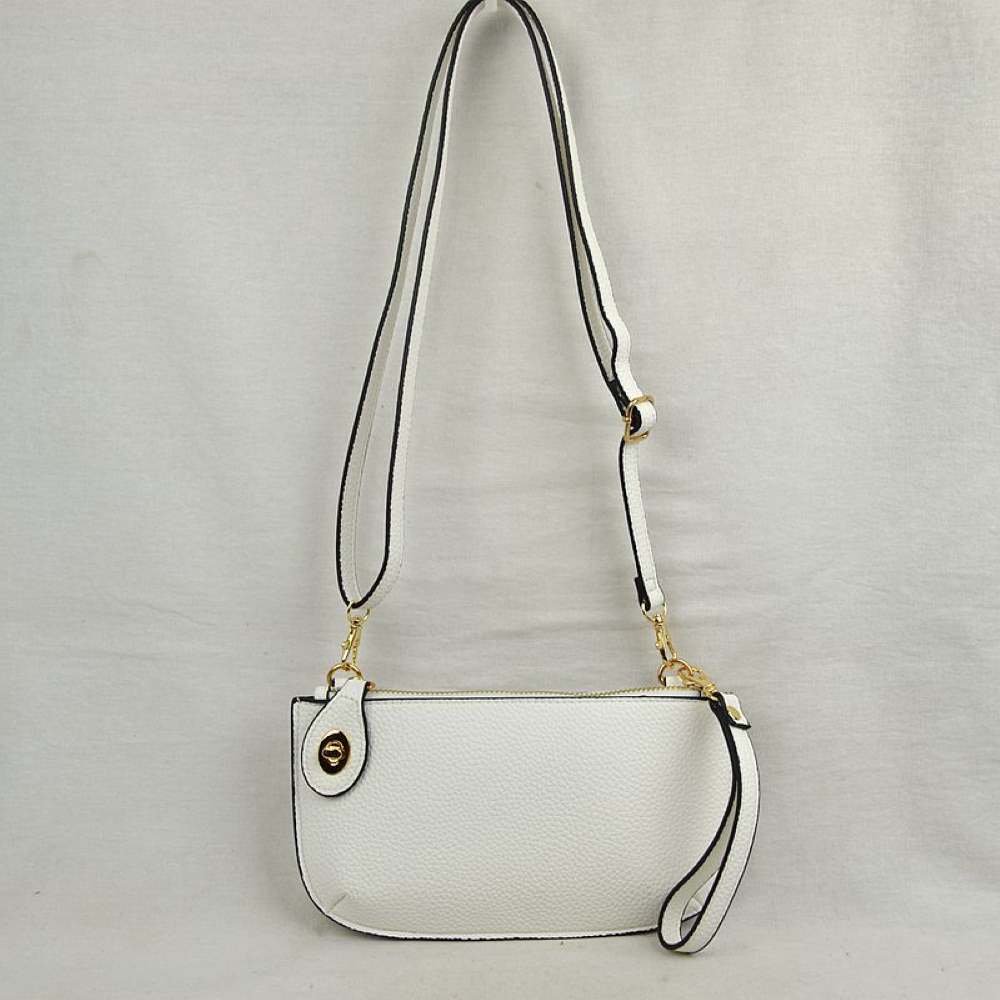 White This versatile everyday bag features a compact pebbled textured body with a slightly curved base silhouette. Designed for organized daily or evening use, the main storage compartment is secured by a top zipper closure and accented with a small decorative metallic turn-lock detail on the side panel. It offers multiple carrying options, equipped with a long, adjustable crossbody shoulder strap and a shorter matching wristlet loop