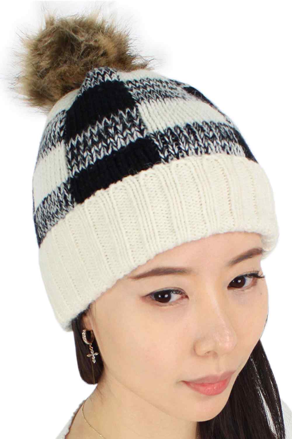 White Buffalo Check Pattern Knit Hat features a timeless buffalo plaid design in a cozy knit for a classic cold-weather look. Crafted with a soft stretch fit, it delivers warm comfort while adding rustic style to your everyday winter outfits.