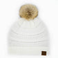White Stay warm and cozy with this classic C.C Pom Pom Knit Beanie, crafted from 100% soft acrylic for all-day comfort. The ribbed knit design adds texture and durability, while the signature pom pom on top brings a playful touch to any winter outfit. One size fits most, making it the perfect accessory for everyone. Ideal for cold weather adventures or casual everyday wear.