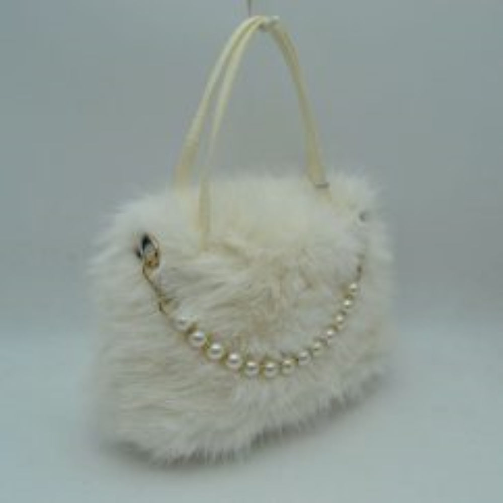 White This unique everyday handbag showcases a soft, textured plush exterior that introduces a cozy aesthetic to your accessory collection. The bag features an expansive central storage compartment to accommodate your daily essentials, styled with double top handles for traditional hand carrying. A distinctive strand of large pearl-like beads draped across the front adds a elegant decorative accent