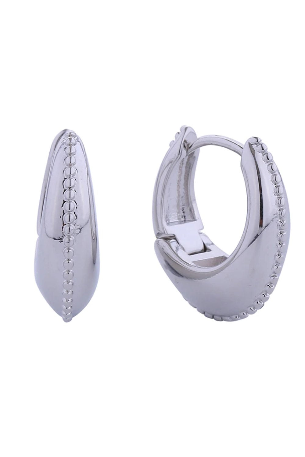 White Gold Elevate your everyday look with these stunning 14K Gold/White Gold Dipped Beaded Puff Huggie Hoop Earrings. Crafted from hypoallergenic brass, these petite hoops feature a textured beaded design that catches the light beautifully. At 1.8cm in diameter, they're the perfect size for comfortable all-day wear that hugs close to the ear. Lead and nickel compliant, these earrings are safe for sensitive skin.