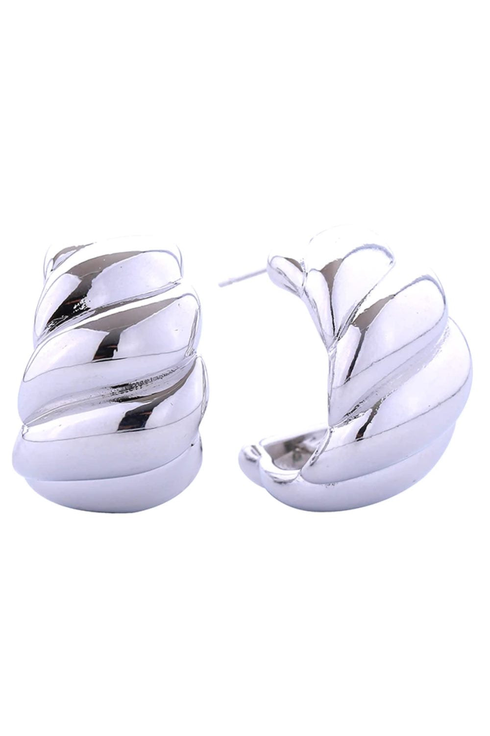 White Gold Elegant wave-inspired post earrings crafted in brass with a luxurious 14K gold and white dip finish. Measuring 3.1cm in diameter, these statement pieces offer the perfect balance of bold design and wearable comfort. Hypoallergenic construction makes them ideal for sensitive skin, while lead and nickel compliance ensures safe, worry-free wear. A versatile addition to any jewelry collection.