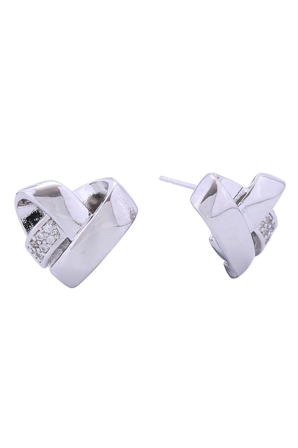White Gold Delicate broken heart design crafted in 14K gold and white dipped brass, adorned with sparkling cubic zirconia pavé stones. These hypoallergenic post earrings measure 1.6cm in diameter, making them the perfect everyday accessory. Lead and nickel compliant for sensitive skin. A meaningful piece that combines elegance with comfort.