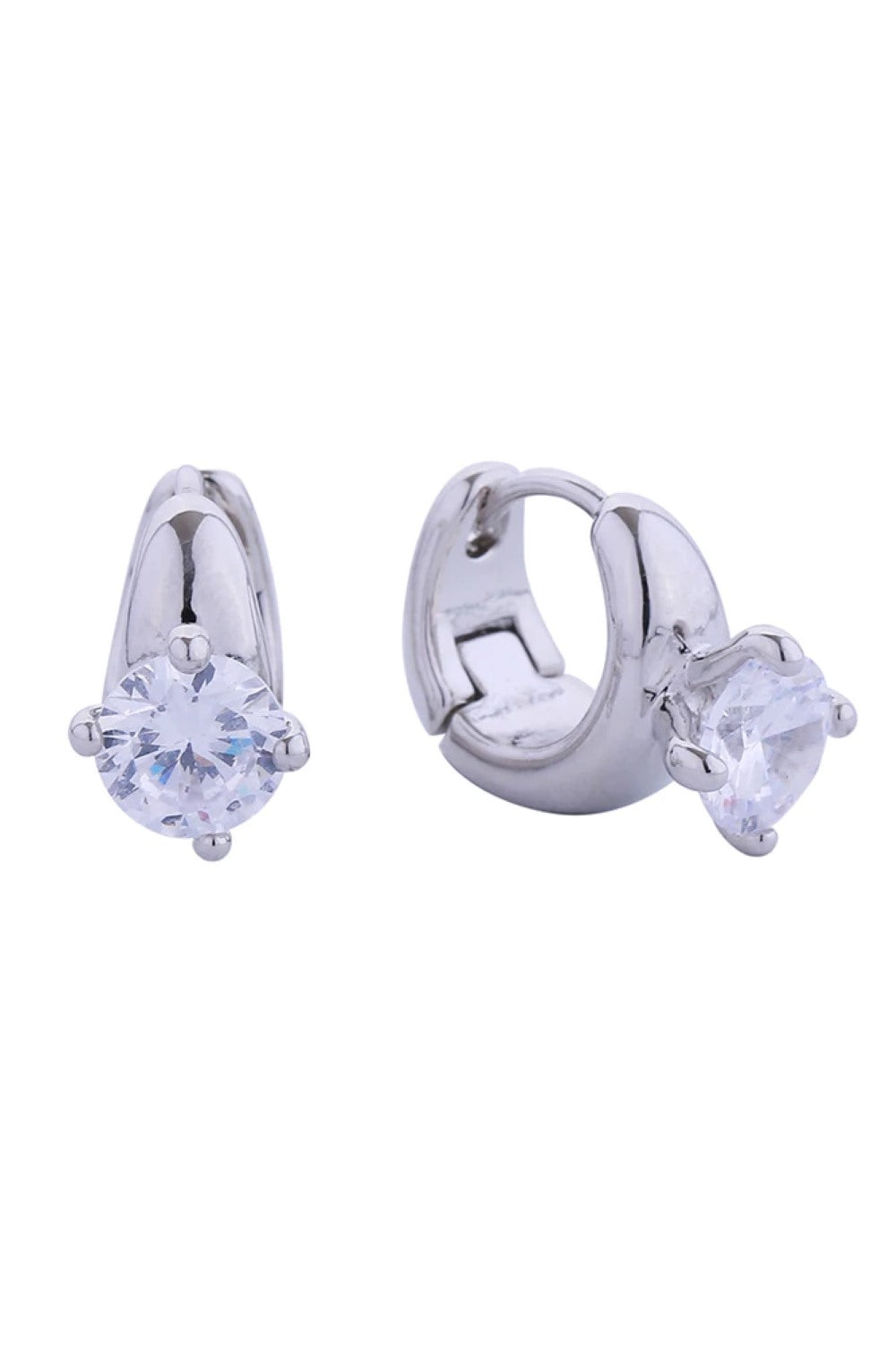 White Gold Elevate your everyday elegance with these stunning 14K Diamond Ring Pave CZ Huggie Earrings. Crafted from hypoallergenic brass, these versatile pieces feature brilliant cubic zirconia pavé detailing that catches the light beautifully. With a comfortable 1.8cm diameter, they're perfect for all-day wear. Lead and nickel compliant, these earrings deliver luxury without compromise ideal for sensitive skin and conscious shoppers alike.