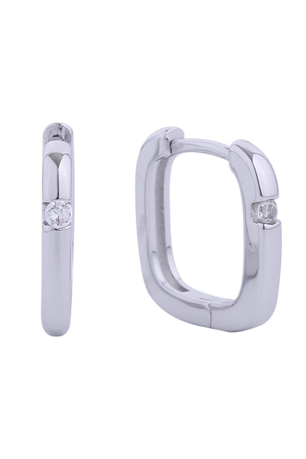 White Gold Elevate your everyday elegance with these stunning Huggie Hoop earrings. Crafted with 14K gold and white gold dipping over brass, they feature sparkling cubic zirconia pavé detailing for a luxurious finish. At 1.3cm in diameter, these petite hoops offer the perfect balance of sophistication and comfort. Hypoallergenic construction ensures gentle wear for sensitive ears, while lead and nickel compliance guarantees safety and peace of mind.