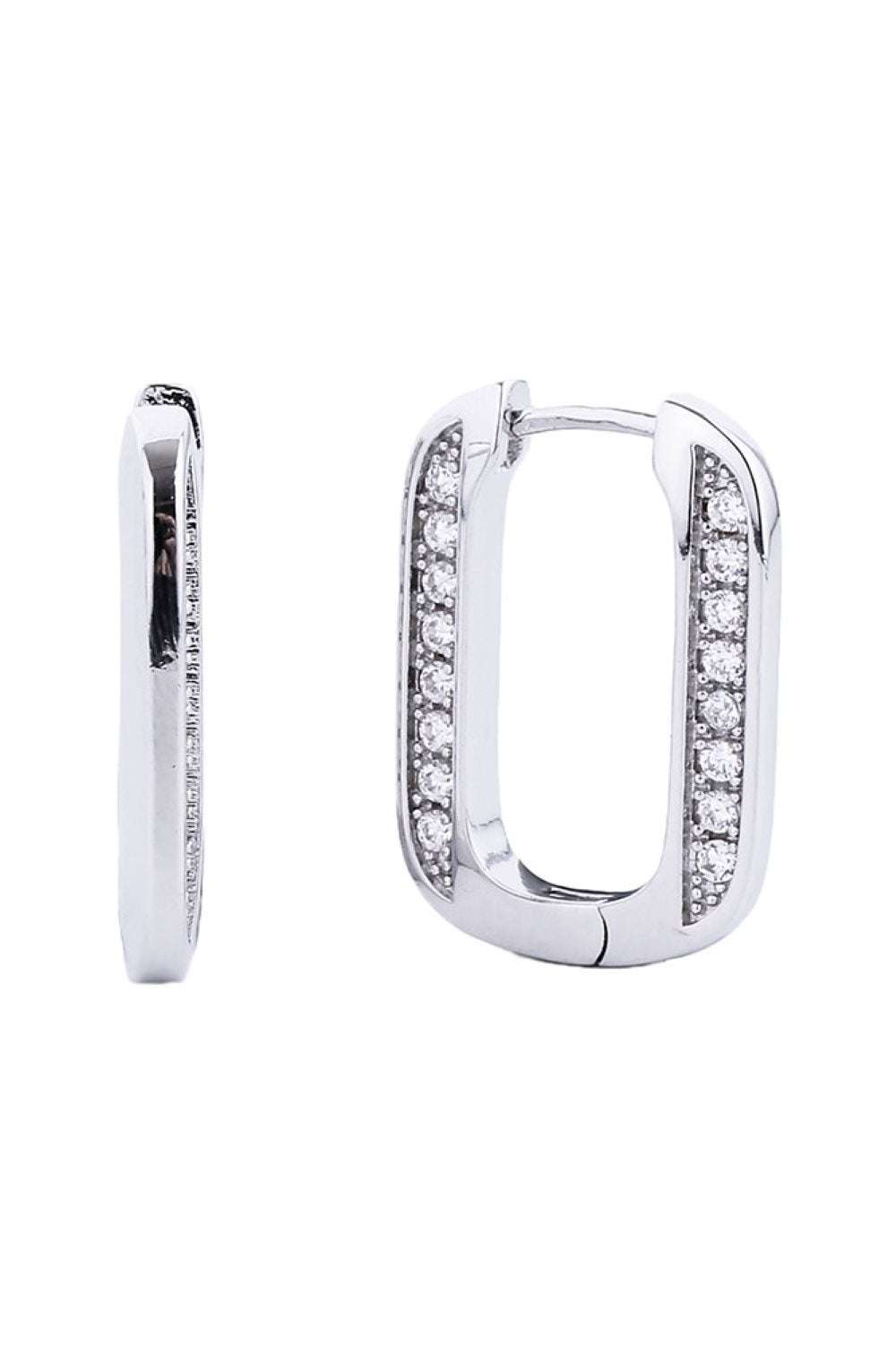 White Gold Elegant huggie hoops featuring a lustrous 14K gold and white dip finish, adorned with sparkling cubic zirconia pavé detailing. Crafted from hypoallergenic brass, these earrings are perfect for sensitive skin. With a comfortable 2.03cm diameter, they offer a timeless look that transitions seamlessly from day to night. Lead and nickel compliant for safe, worry-free wear.