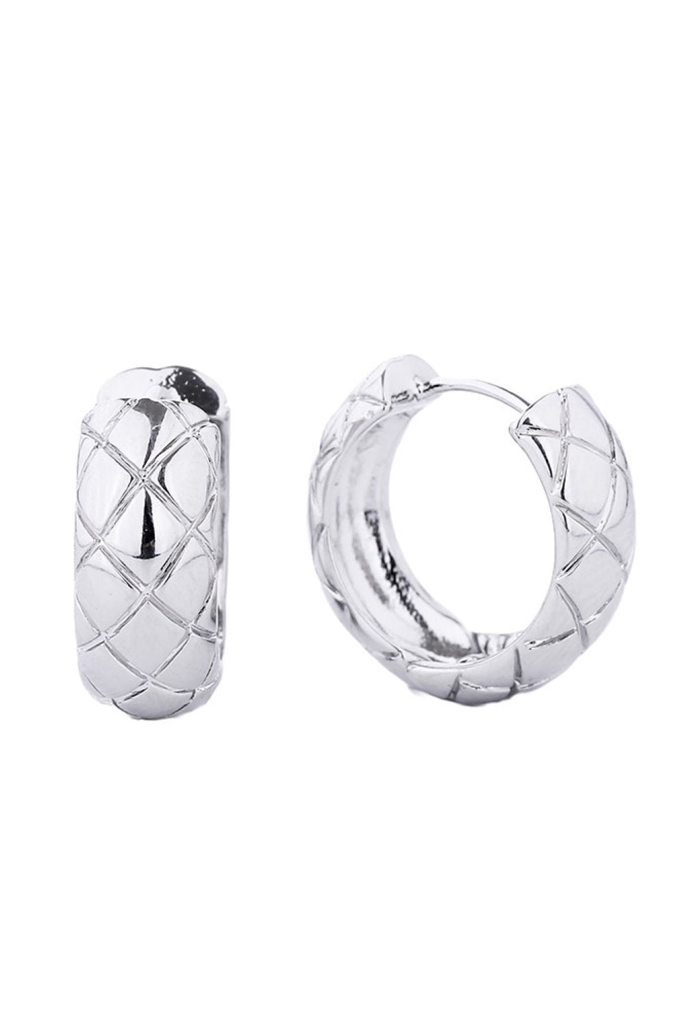 White Gold Delicate huggie hoops crafted with 14K gold and white gold dipping over hypoallergenic brass. These petite earrings feature a comfortable 2.11cm diameter, perfect for everyday wear. Lead and nickel compliant, making them ideal for sensitive skin. Lightweight and versatile, they complement any style while maintaining the luxury look you love.