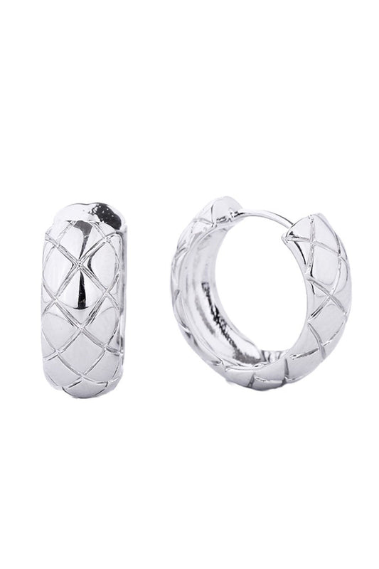 White Gold Delicate huggie hoops crafted with 14K gold and white gold dipping over hypoallergenic brass. These petite earrings feature a comfortable 2.11cm diameter, perfect for everyday wear. Lead and nickel compliant, making them ideal for sensitive skin. Lightweight and versatile, they complement any style while maintaining the luxury look you love.
