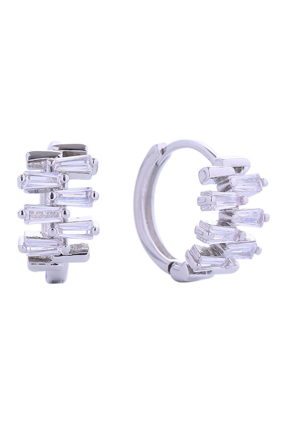 White Gold Elevate your everyday look with these stunning 14K Gold/White Gold Dipped Huggie Earrings. Featuring a playful disorganized cubic zirconia design, these petite 1.8cm earrings deliver maximum sparkle in a minimalist silhouette. 