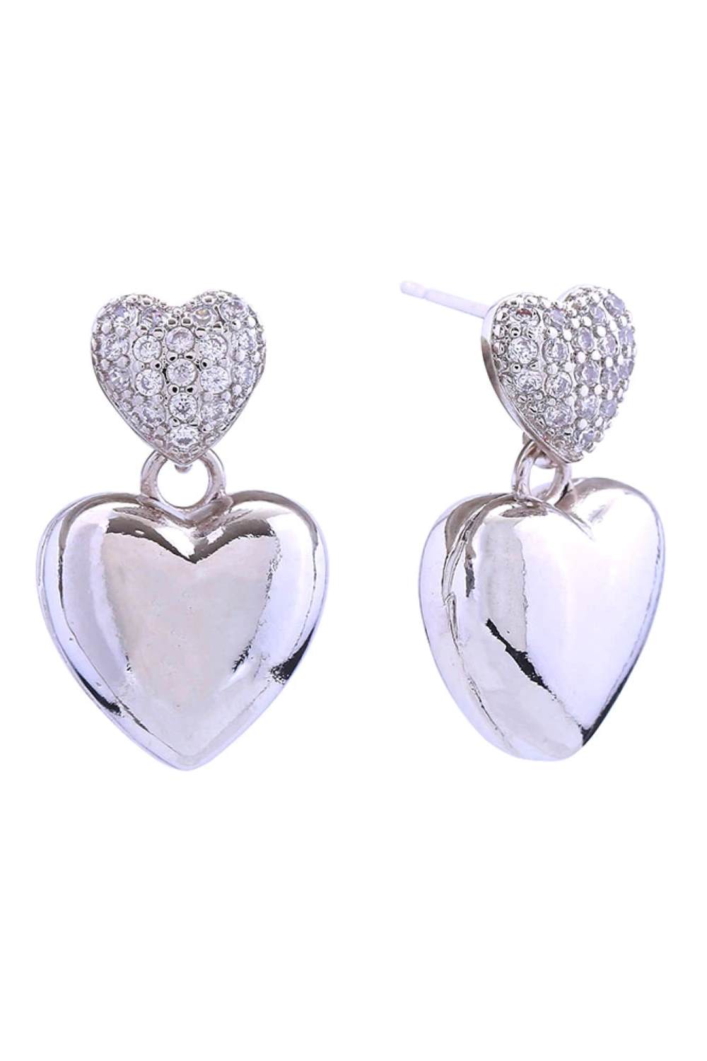 White Gold Elegant double heart design with sparkling cubic zirconia pavé detailing, dipped in 14K gold and white finishes. Crafted from hypoallergenic brass, these 1.8cm post earrings are perfect for sensitive skin. Lead and nickel compliant for safe, everyday wear. A timeless addition to any jewelry collection.