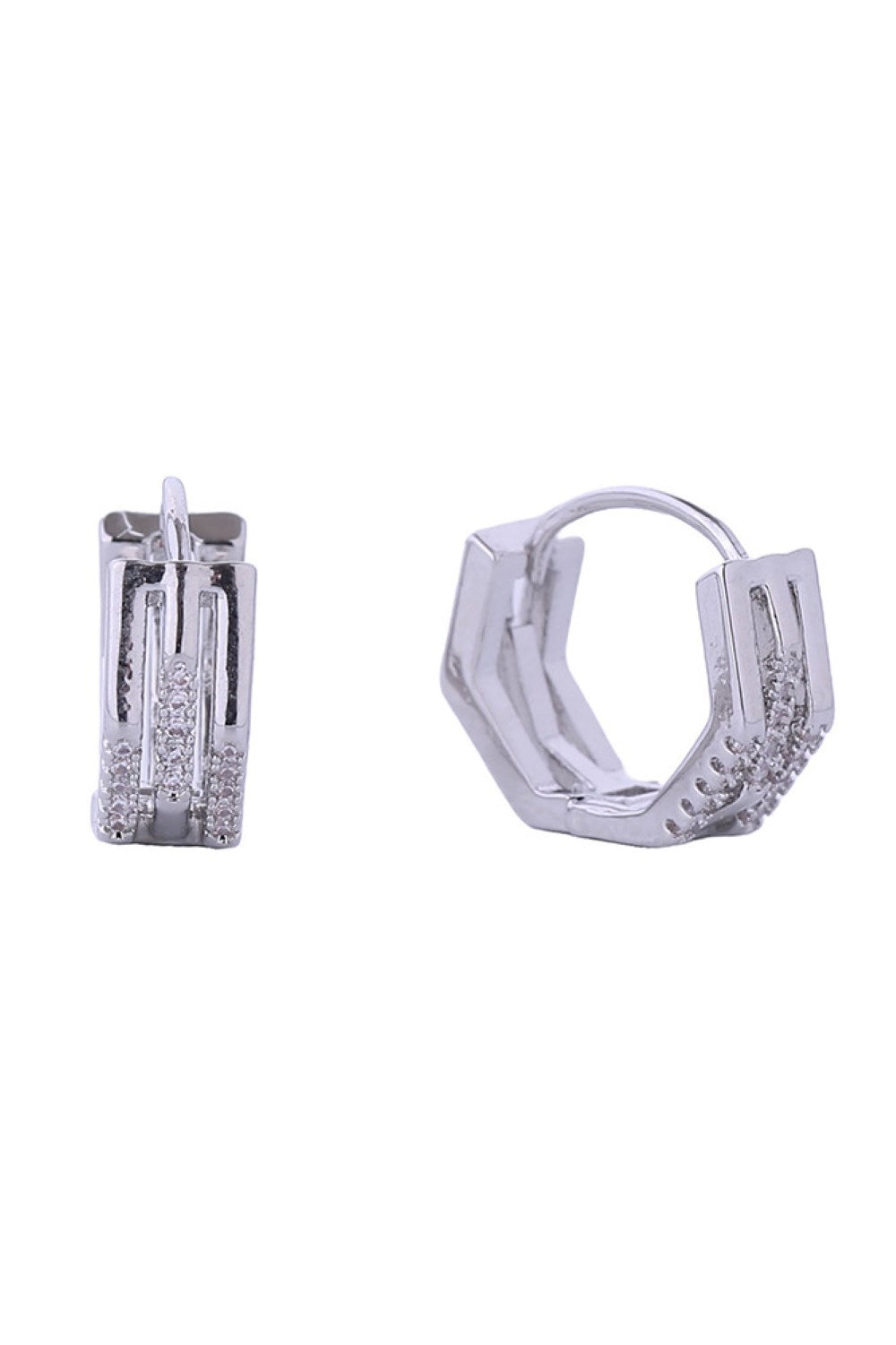 White Gold Elevate your everyday look with these stunning 14K Duo Octagon Huggie Earrings. Crafted in Korea with a luxurious gold and white gold dipped finish, these petite 1.5cm huggies feature brilliant cubic zirconia stones that catch the light beautifully. Made from hypoallergenic brass, they're gentle on sensitive skin and fully lead and nickel compliant for worry-free wear. The octagon design adds modern sophistication to any outfit, from casual to dressed up.