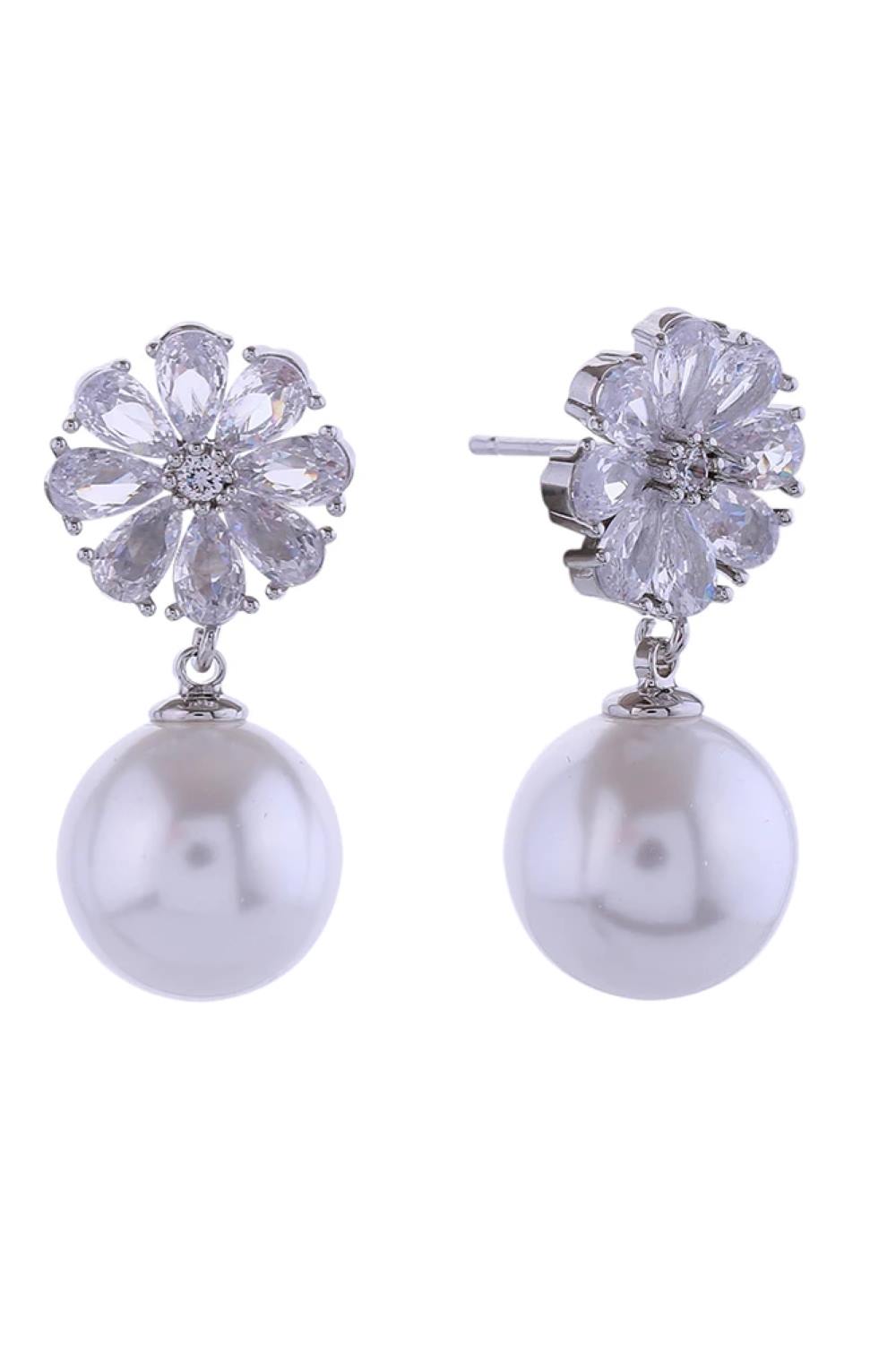 White Gold Elegant post earrings featuring delicate flower-shaped crystal tops paired with lustrous pearl accents. Crafted from hypoallergenic brass with 14K gold or white gold dipping for a luxurious finish. Each earring measures 2.4cm in diameter, offering a refined yet noticeable presence. Set with cubic zirconia stones that catch the light beautifully. Lead and nickel compliant for sensitive skin.