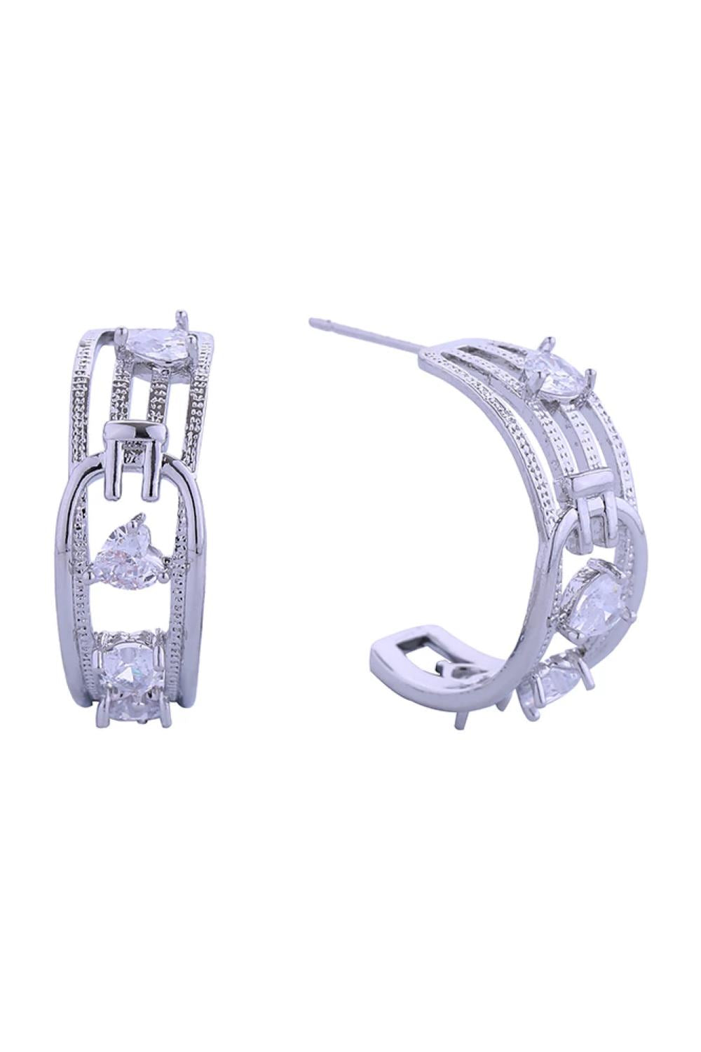 White Gold Elevate your everyday look with these stunning 14K Gold/White Dipped Fusion Hoop Pave CZ Post Earrings. Crafted from quality brass and adorned with sparkling cubic zirconia pavé detailing, these hoops deliver luxury appeal at an accessible price point. Measuring 2.6cm in diameter, they offer the perfect balance of presence and wearability. The hypoallergenic design makes them ideal for sensitive ears, while lead and nickel compliance ensures safe, worry-free wear. 