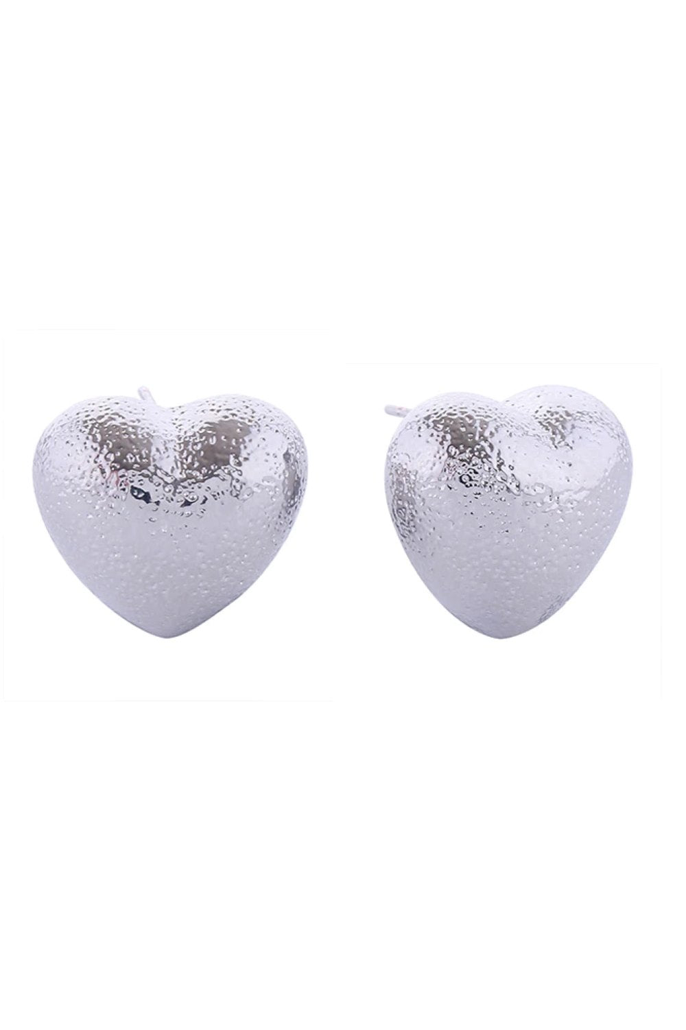 White Gold Delicate heart-shaped post earrings crafted in brass with a shimmering glitter texture finish. Each earring measures 1.2cm in diameter, perfect for everyday wear or special occasions. Hypoallergenic design makes them ideal for sensitive ears. Lead and nickel compliant for safe, worry-free wearing. A charming addition to any jewelry collection.