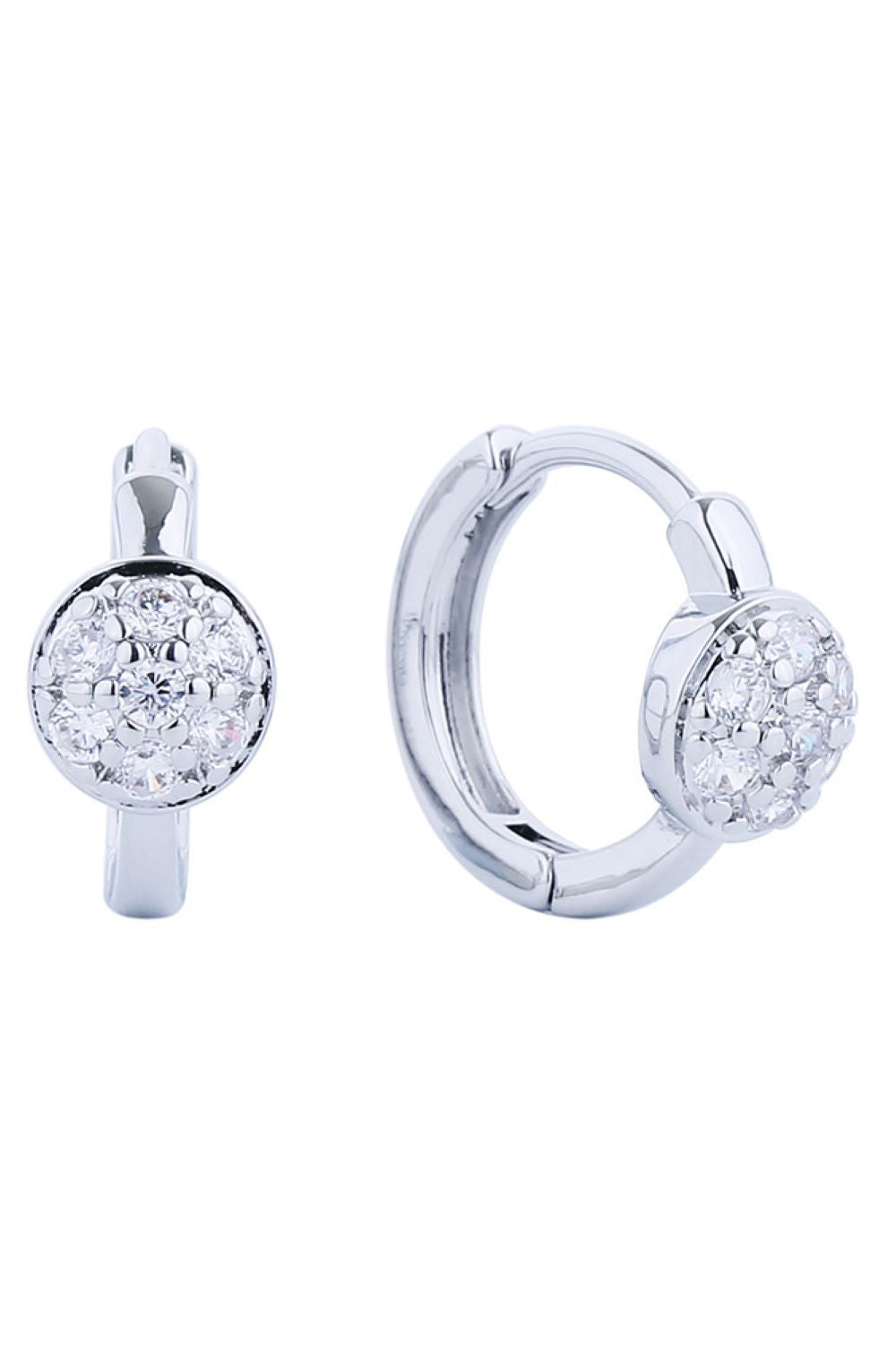 White Gold Delicate 14K gold-dipped huggie hoops featuring sparkling cubic zirconia pavé detailing. These petite earrings measure 1.4cm in diameter, perfect for everyday elegance or layering. Crafted from hypoallergenic brass with lead and nickel-free construction, they're gentle on sensitive ears. The lustrous gold finish catches light beautifully while maintaining durability. Ideal for those seeking timeless, minimalist jewelry that doesn't compromise on style or comfort.