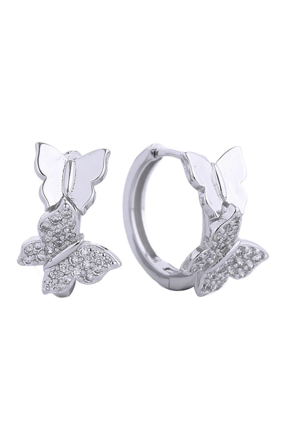 White Gold Elegant huggie hoop earrings featuring a luxurious 14K gold and white dip finish. Adorned with sparkling cubic zirconia pavé detailing for a sophisticated sparkle. Crafted from hypoallergenic brass, these earrings are gentle on sensitive skin and compliant with lead and nickel standards. The compact 2.03cm diameter offers a comfortable, everyday wear option that transitions seamlessly from casual to formal occasions. A timeless addition to any jewelry collection.