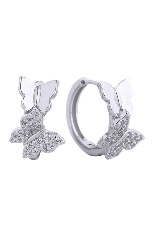 White Gold Elegant huggie hoop earrings featuring a luxurious 14K gold and white dip finish. Adorned with sparkling cubic zirconia pavé detailing for a sophisticated sparkle. Crafted from hypoallergenic brass, these earrings are gentle on sensitive skin and compliant with lead and nickel standards. The compact 2.03cm diameter offers a comfortable, everyday wear option that transitions seamlessly from casual to formal occasions. A timeless addition to any jewelry collection.