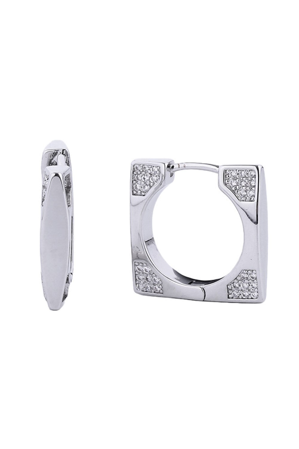 White Gold Timeless sophistication meets modern comfort in these 14K gold and white dipped huggie hoops. Each earring features brilliant cubic zirconia pavé work that catches light beautifully, while the compact 1.78cm diameter keeps them effortlessly wearable for any occasion. Built from durable brass with a hypoallergenic design, these earrings are lead and nickel compliant ideal for sensitive ears.