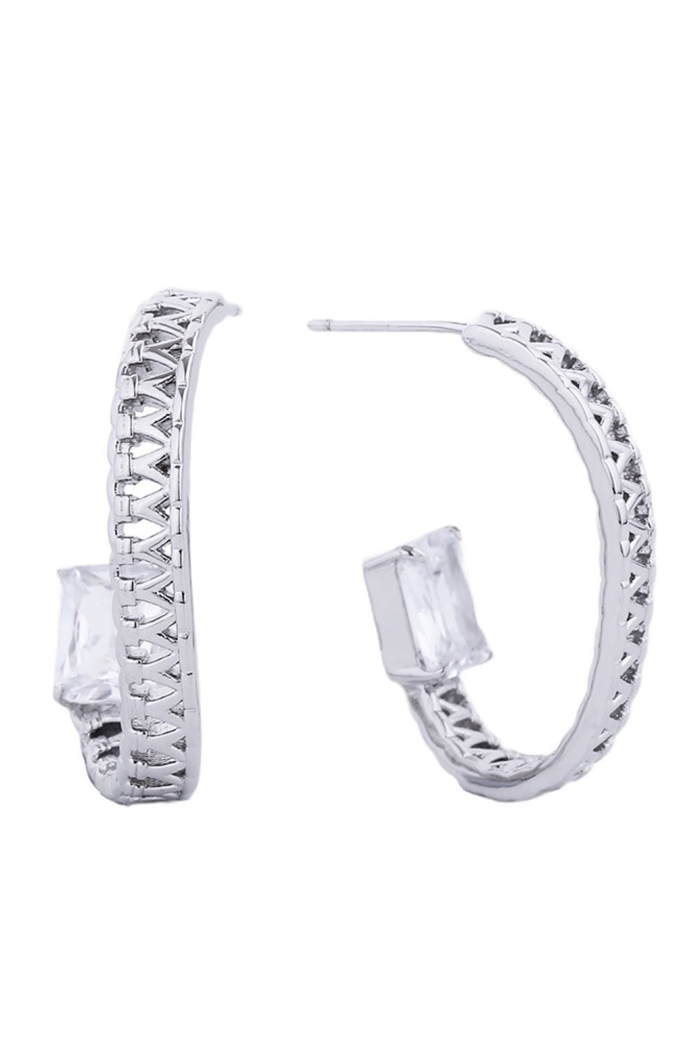 White Gold Elegant post earrings featuring a lustrous 14K gold and white dip finish, adorned with sparkling cubic zirconia pavé detailing. Crafted from hypoallergenic brass, these earrings are perfect for sensitive skin. With a generous 2.79cm diameter, they make a sophisticated statement while remaining comfortable for all-day wear. Lead and nickel compliant for peace of mind. A timeless addition to any jewelry collection.
