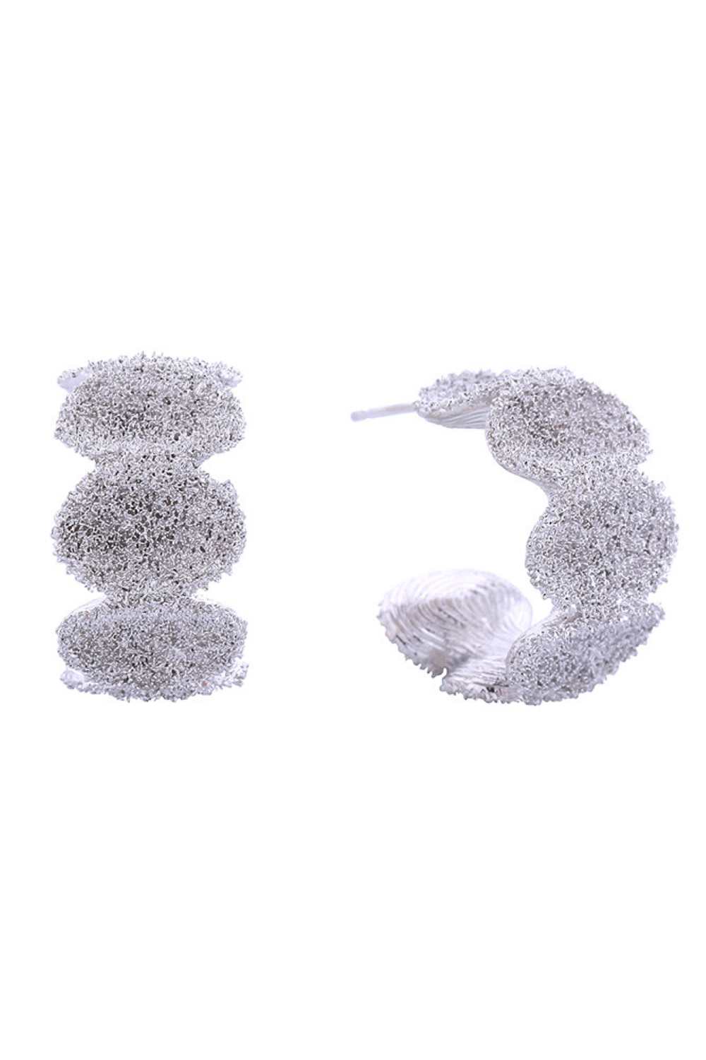 White Gold Elevate your everyday look with these stunning 14K Gold/White Dipped Grain Texture Grumple Post Earrings. Crafted from hypoallergenic brass, these earrings feature a unique textured design that catches the light beautifully. With a comfortable 2.2cm diameter, they're the perfect size for both casual and dressy occasions. Lead and nickel compliant, these earrings are safe for sensitive skin. The secure post backing ensures they stay in place all day long. A versatile addition to any jewelry collec