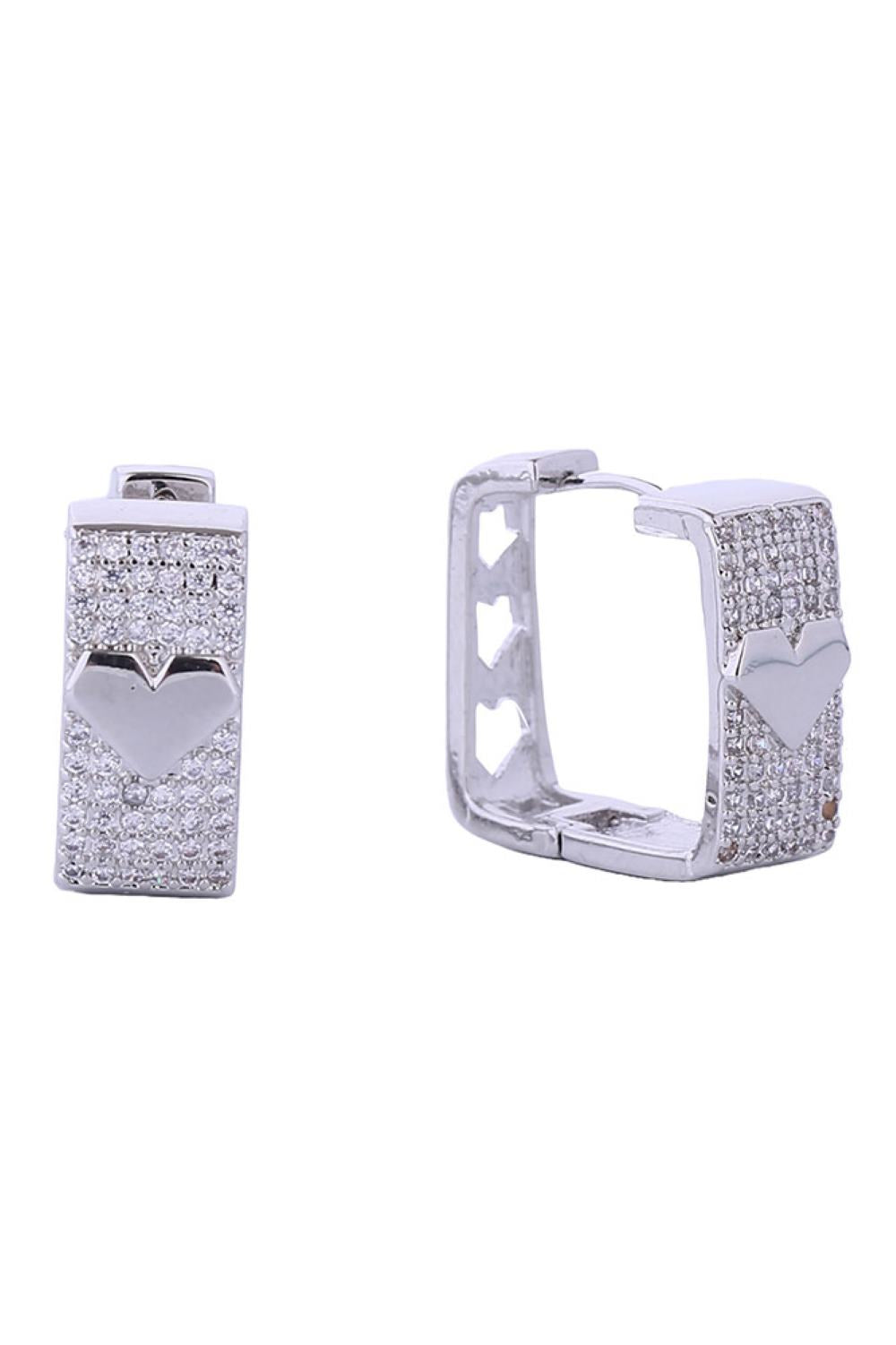 White Gold Elegant heart-in-square huggie earrings crafted in 14K gold or white gold-dipped brass with sparkling cubic zirconia accents. Measuring 1.7cm, these petite hoops offer a delicate yet striking design perfect for everyday wear or special occasions. Hypoallergenic construction ensures comfort for sensitive ears. Lead and nickel compliant for peace of mind. Expertly made in Korea with attention to quality craftsmanship.