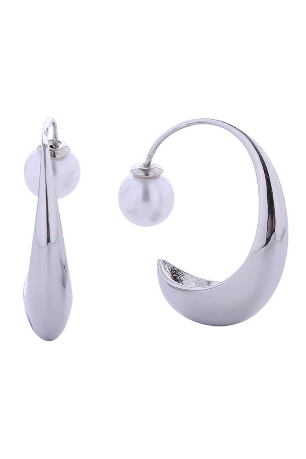 White Gold Elevate your elegance with these stunning 14K Gold/White Gold dipped Large Prince Rubert Drop Pearl Earrings. Crafted from hypoallergenic brass and featuring lustrous pearls, these earrings offer timeless sophistication with a modern edge. Each earring measures 5cm in diameter, making a bold yet graceful statement.