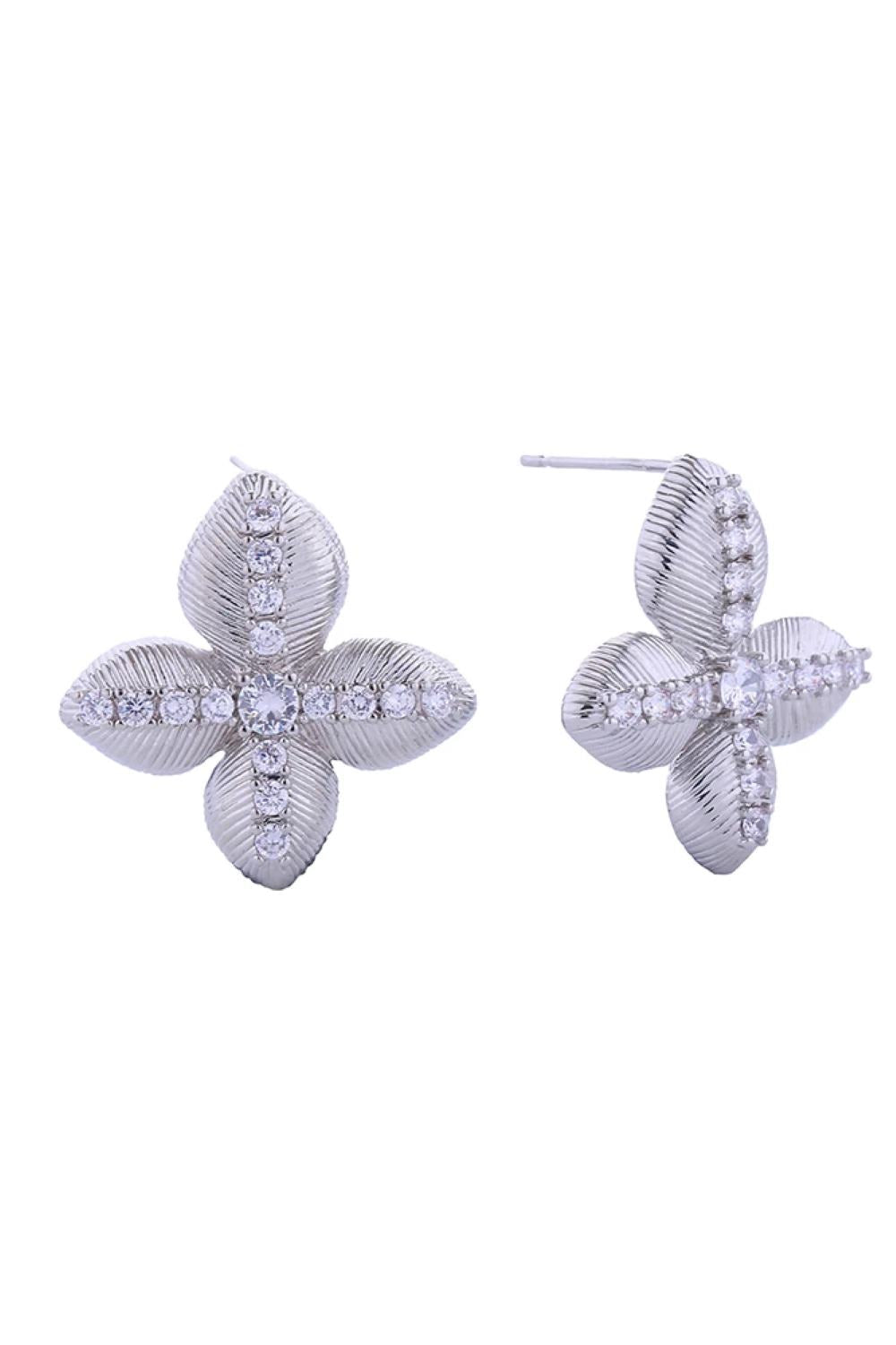 White Gold Elegant lucky clover post earrings crafted in 14K gold and white dipped brass with sparkling cubic zirconia pavé detailing. Each earring measures 2.6cm in diameter, making them a delicate yet eye-catching addition to any jewelry collection. Hypoallergenic construction ensures comfortable all-day wear, while lead and nickel compliance guarantees safety and peace of mind. Perfect for everyday elegance or special occasions.