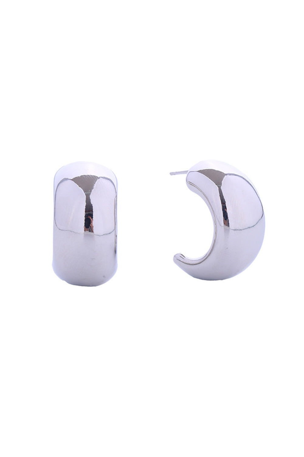 White Gold Elegant post earrings featuring a crescent moon design, delicately dipped in 14K gold and white gold plating. Crafted from hypoallergenic brass, these earrings are perfect for sensitive skin and comply with lead and nickel-free standards. Measuring 2.2cm, they offer a subtle yet sophisticated touch to any look.