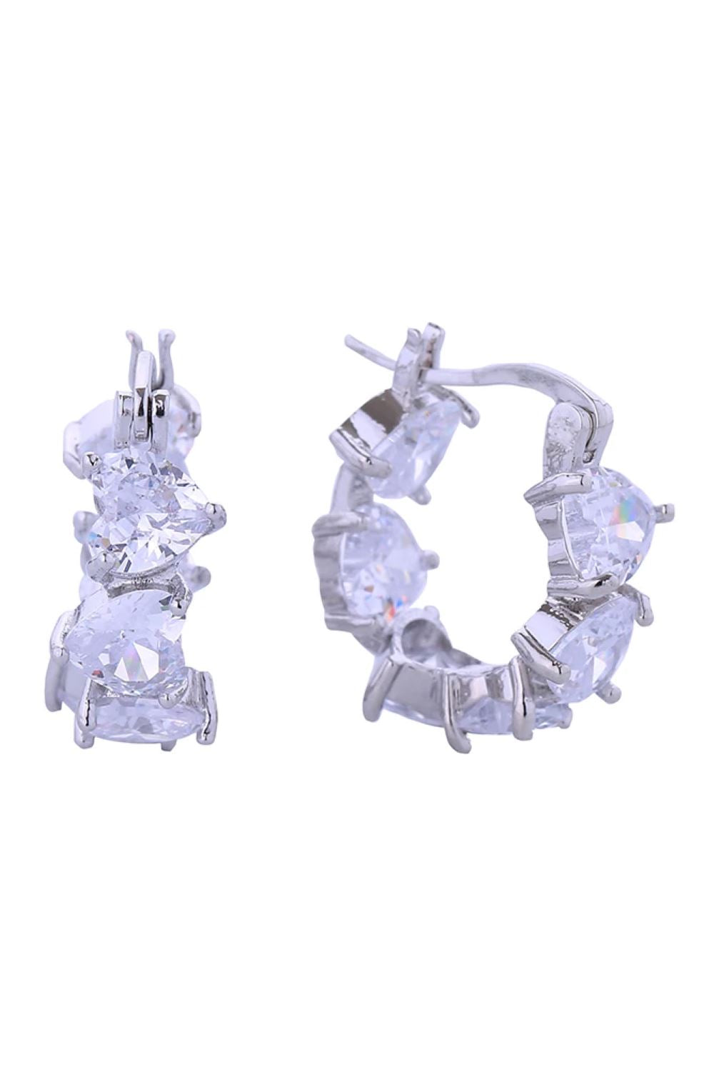 White Gold Elegant post earrings featuring a delicate mingle heart design adorned with sparkling cubic zirconia pavé detailing. Crafted from brass with 14K gold and white dipping for a luxurious two-tone finish. Each earring measures 1.9cm in diameter, offering a refined yet noticeable presence. Hypoallergenic construction ensures comfortable all-day wear, while lead and nickel compliance guarantees safety and peace of mind. Perfect for everyday elegance or special occasions.