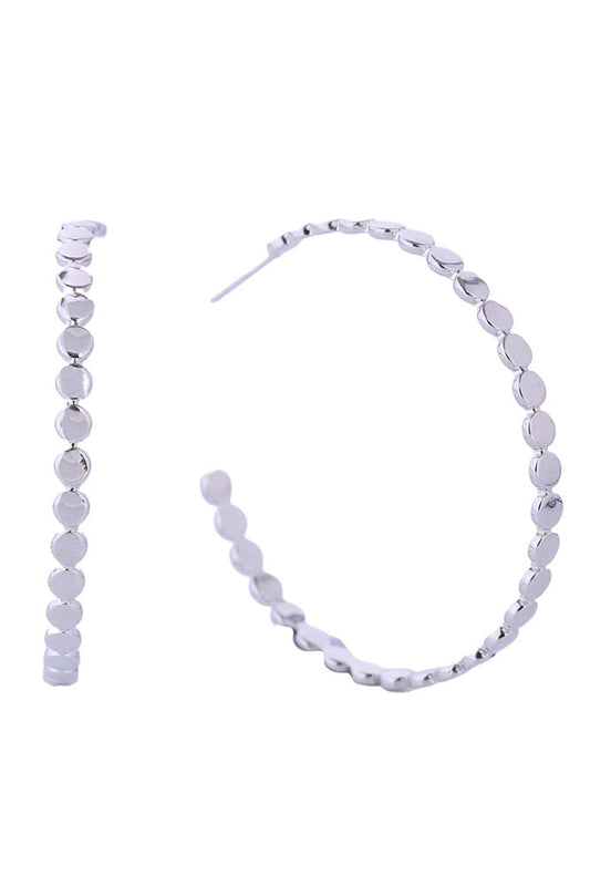 White Gold Delicate mini circle link hoops that blend timeless elegance with everyday wearability. Crafted from hypoallergenic brass with 14K gold or white gold dipping, these 4.8cm earrings are perfect for layering or wearing solo. Lead and nickel compliant for sensitive skin. Made in Korea with attention to quality and comfort. A versatile staple that transitions seamlessly from day to night.