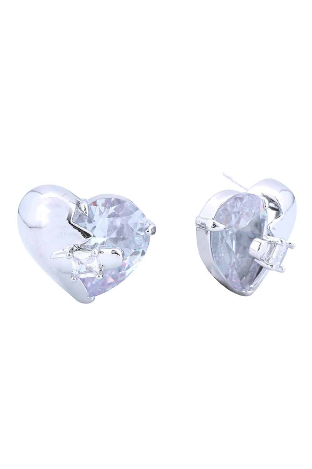 White Gold Elegant 14K gold and white dipped post earrings featuring a mystical heart design adorned with sparkling cubic zirconia pavé stones. Crafted from hypoallergenic brass, these earrings are perfect for sensitive skin and everyday wear. Each earring measures 2.2cm in diameter, offering a delicate yet eye-catching presence. Lead and nickel compliant for safe, worry-free styling. A timeless piece that combines luxury appeal with comfort and durability.