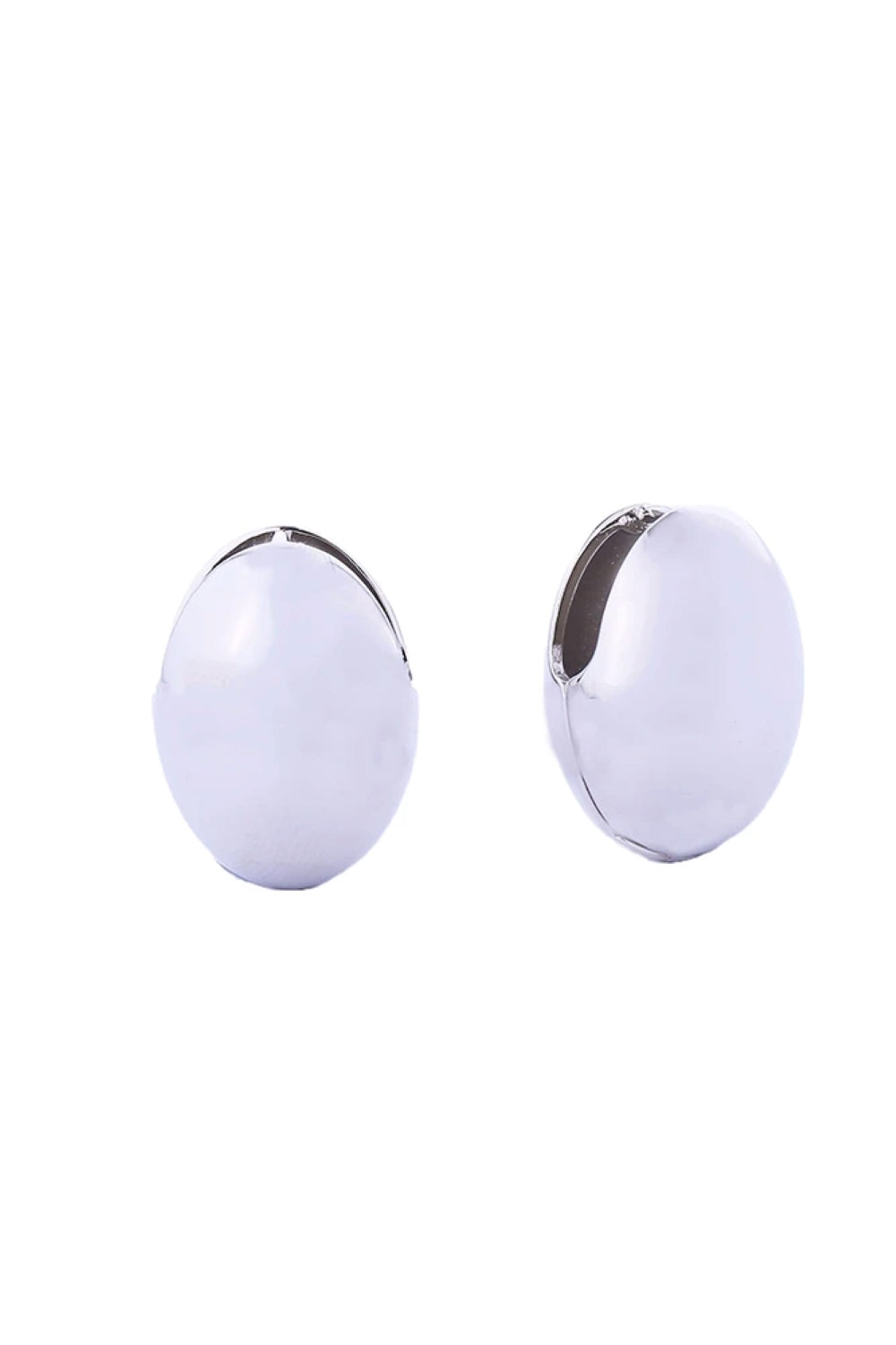 White Gold Elegant oval dome huggie earrings crafted in 14K gold or white gold-dipped brass. These hypoallergenic earrings feature a sophisticated curved design that hugs the earlobe beautifully. With a 1.7cm diameter, they offer the perfect balance of presence and comfort for everyday wear or special occasions. Lead and nickel compliant for sensitive skin. Expertly made in Korea with attention to quality and detail.