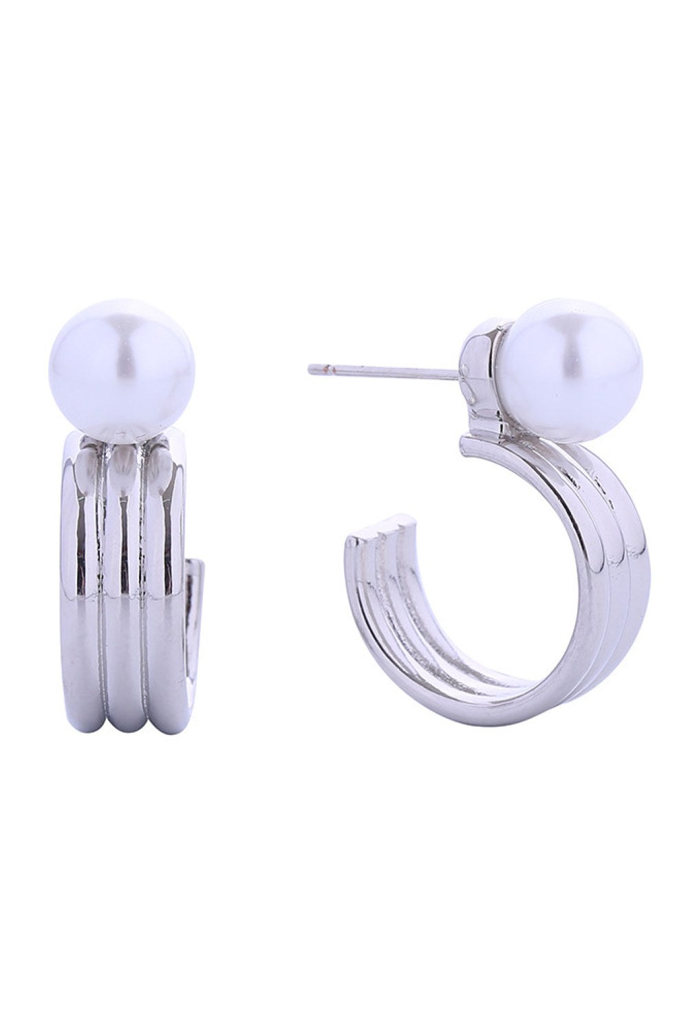 White Gold Elegant pearl-adorned hoop post earrings crafted with 14K gold and white gold dipping over brass. Each piece features a lustrous pearl accent set on a delicate hoop design, measuring 1.6cm for a refined, understated look. Hypoallergenic construction ensures comfort for sensitive ears. 